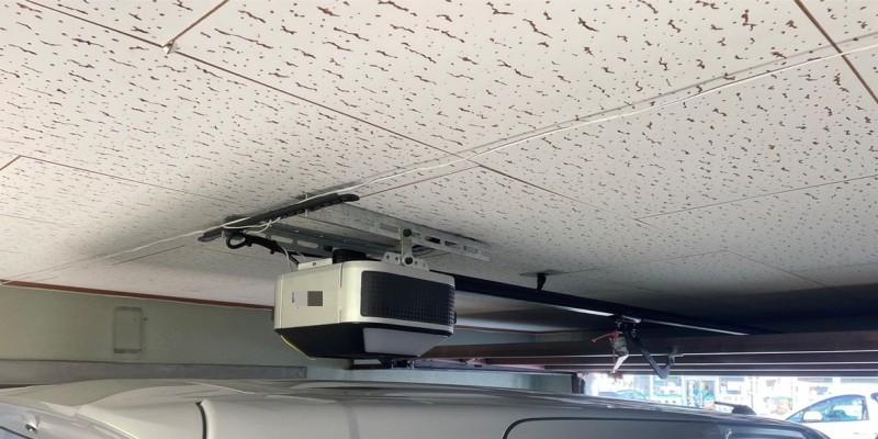 オーバードア　開閉機・レール　交換工事