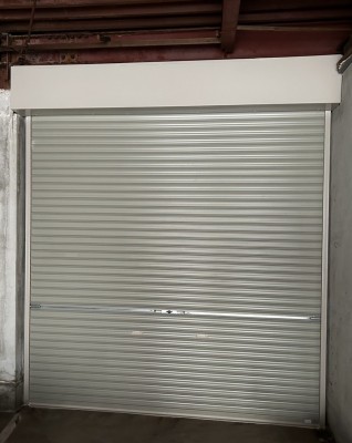 倉庫　手動シャッターの交換工事