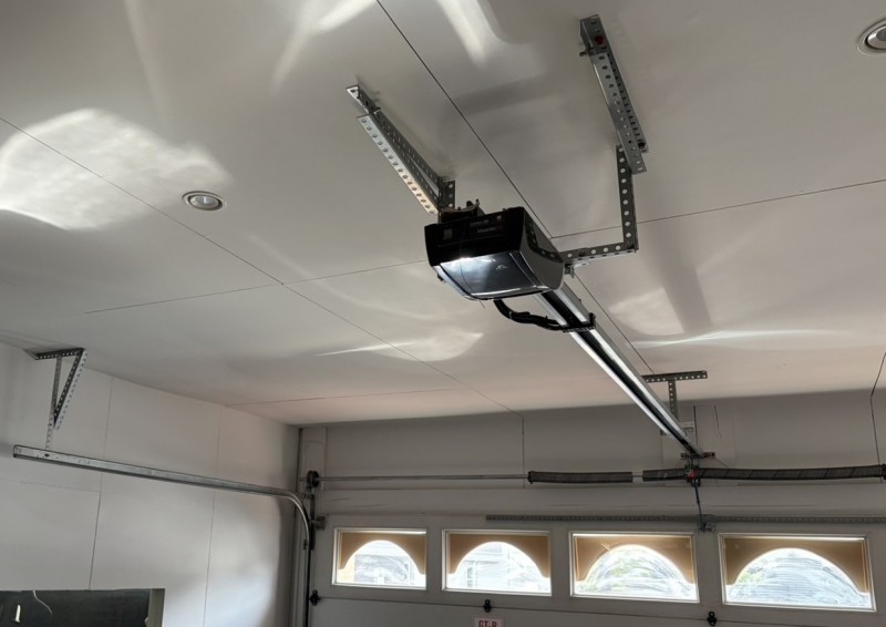 車庫　電動オーバードアシャッター　バネ断裂　バネ交換