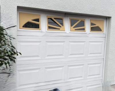 車庫　電動オーバードアシャッター　物を挟んだ　　パネル補修・開閉機交換