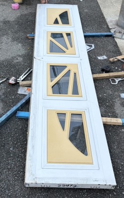 車庫　電動オーバードアシャッター　物を挟んだ　　パネル補修・開閉機交換