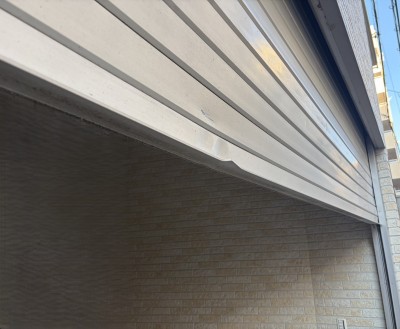 車庫　電動シャッター　スラット脱線復旧作業